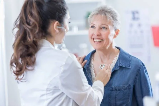 An old woman having check in an urgent care clinic